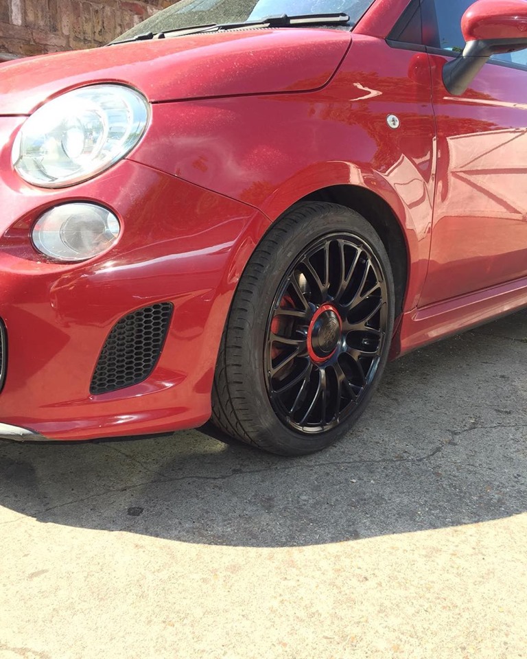 67341410_634600837049546_5007895183820324864_n Red car with Black alloys