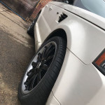 Black rims on a white Range Rover