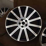 Silver rims with lines through spokes