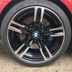 black and silver BMW alloys
