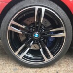 black and silver BMW alloys